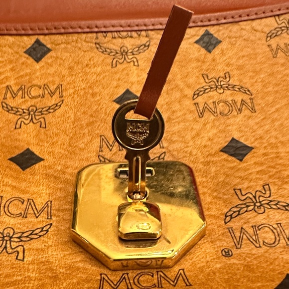 MCM Visetos Cognac Monogram Leather Clutch unisex Comes with original key! A+ - Picture 9 of 12
